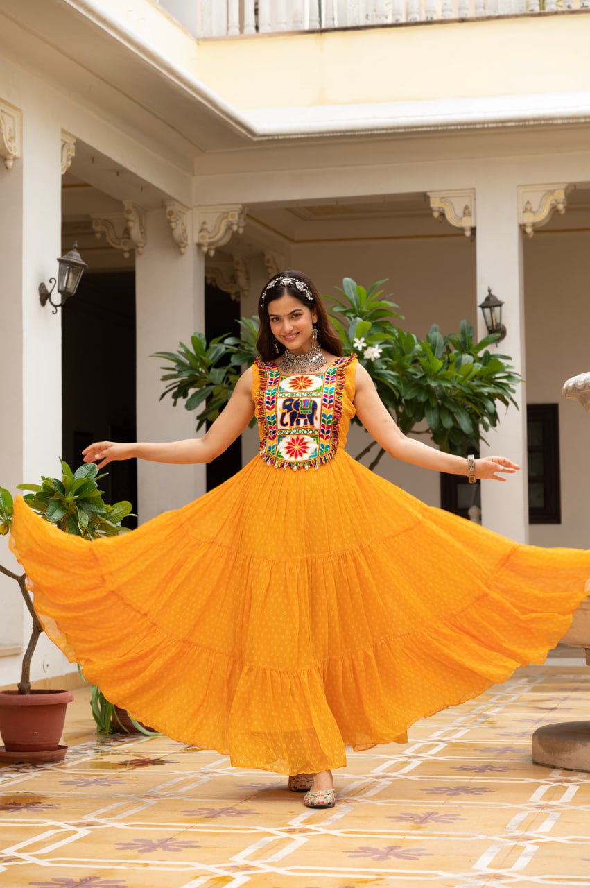 Yellow faux georgette Bandhani print Kutchi patch mirror work gown