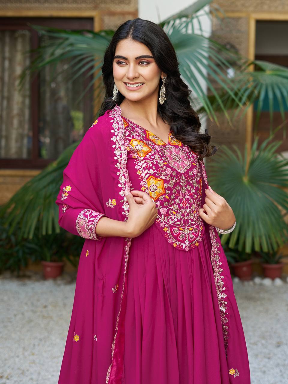 Pink heavy sequins thread embroidered georgette gown for wedding functions