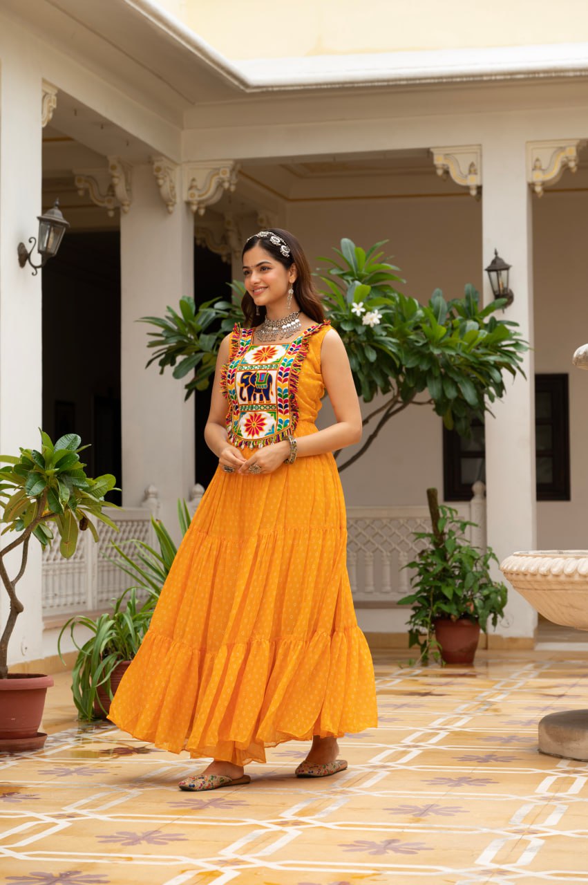Yellow faux georgette Bandhani print Kutchi patch mirror work gown