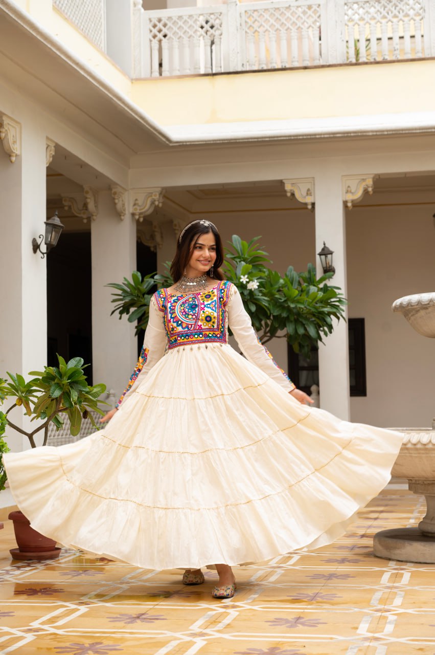 Off-white cotton gown with Kutchi Gamthi mirror embroidery and lace