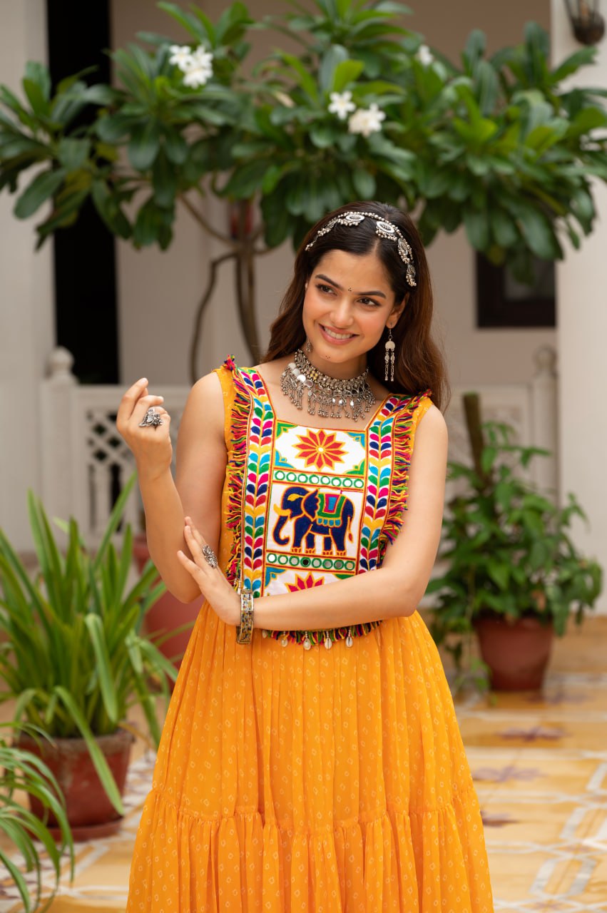 Yellow faux georgette Bandhani print Kutchi patch mirror work gown
