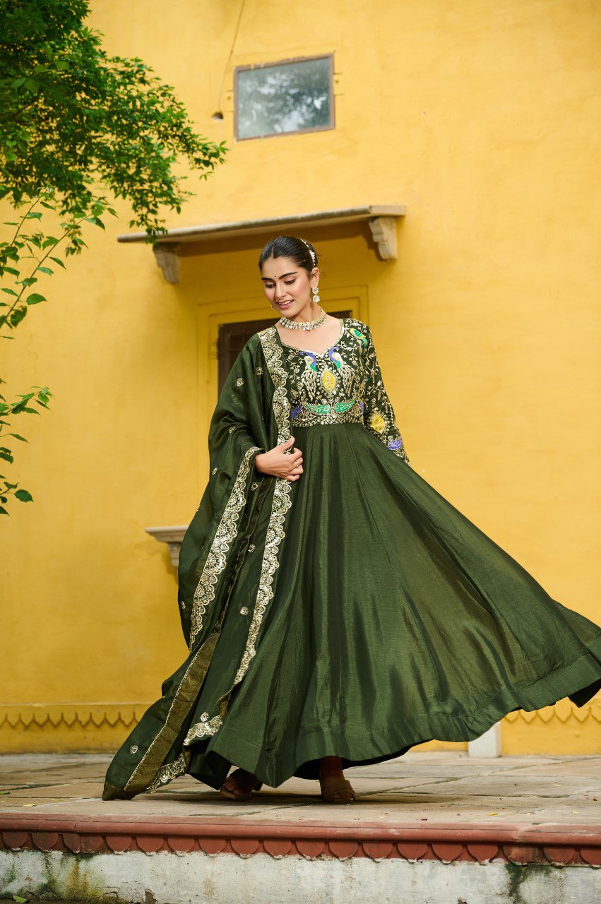 Maroon silk gown with multi thread zari embroidery and dupatta