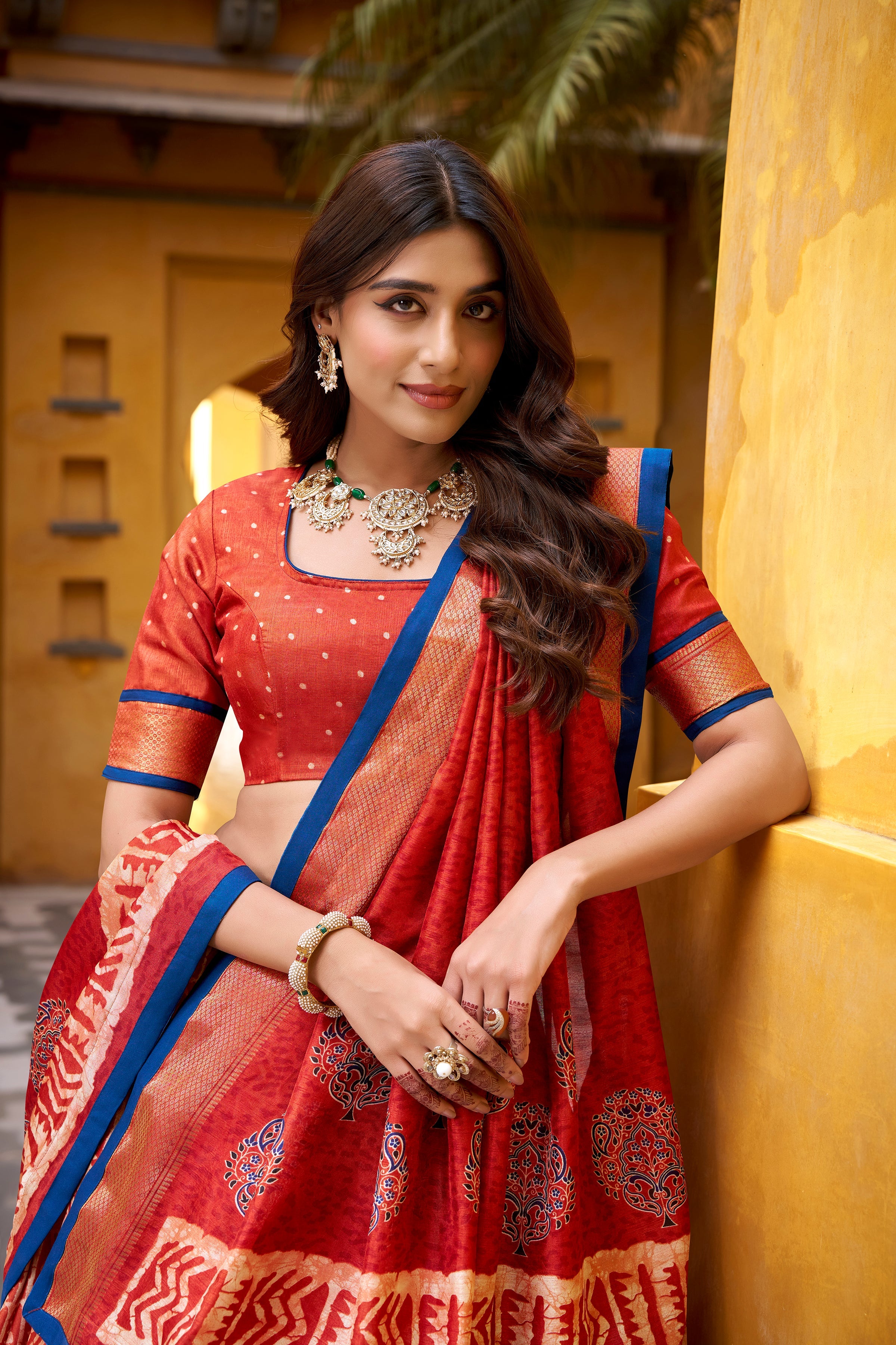 Girija rust orange Dola silk batik print lehenga choli with zari weaving work
