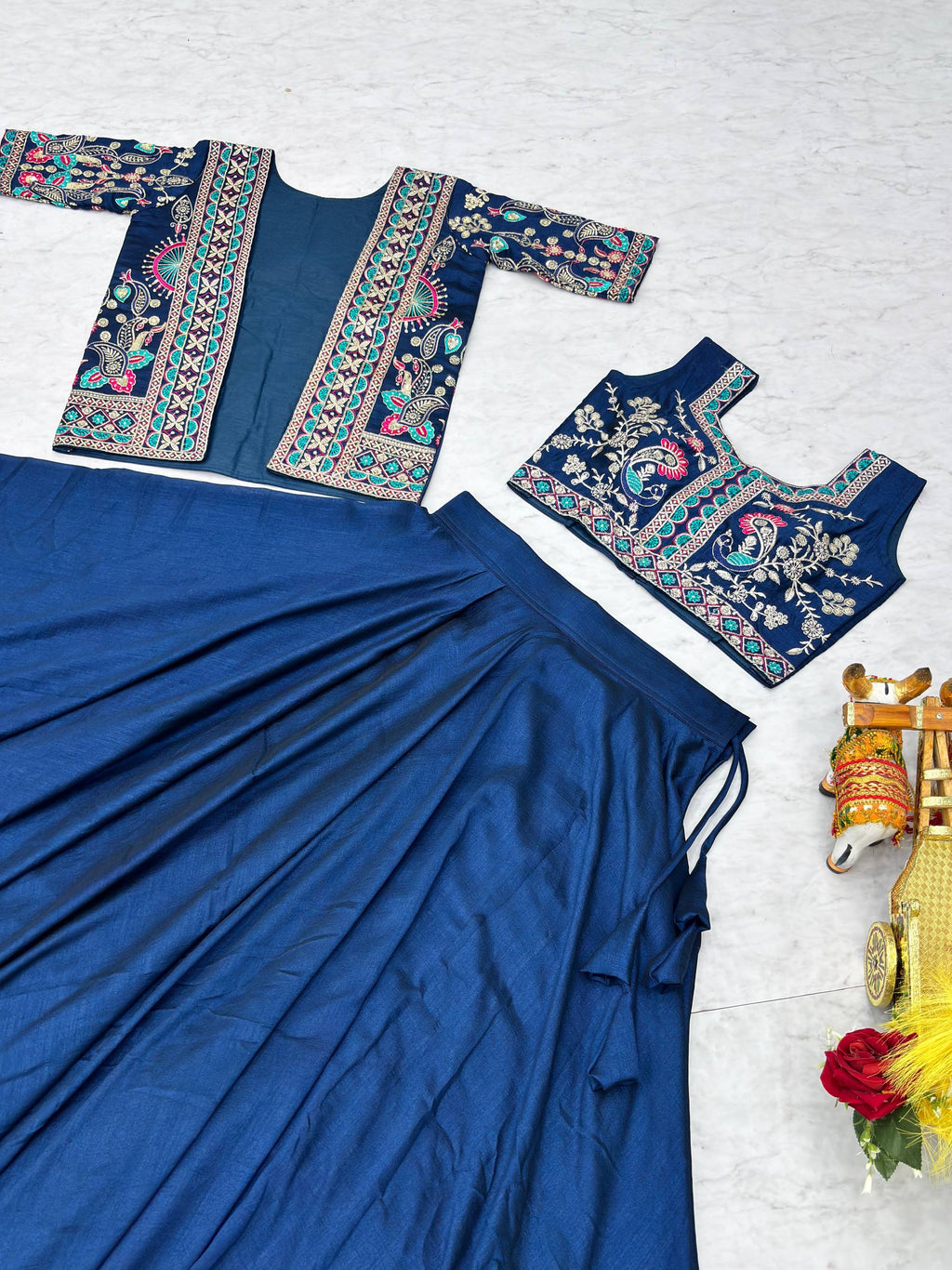 Devisha blue Vichitra silk lehenga choli with embroidered koti