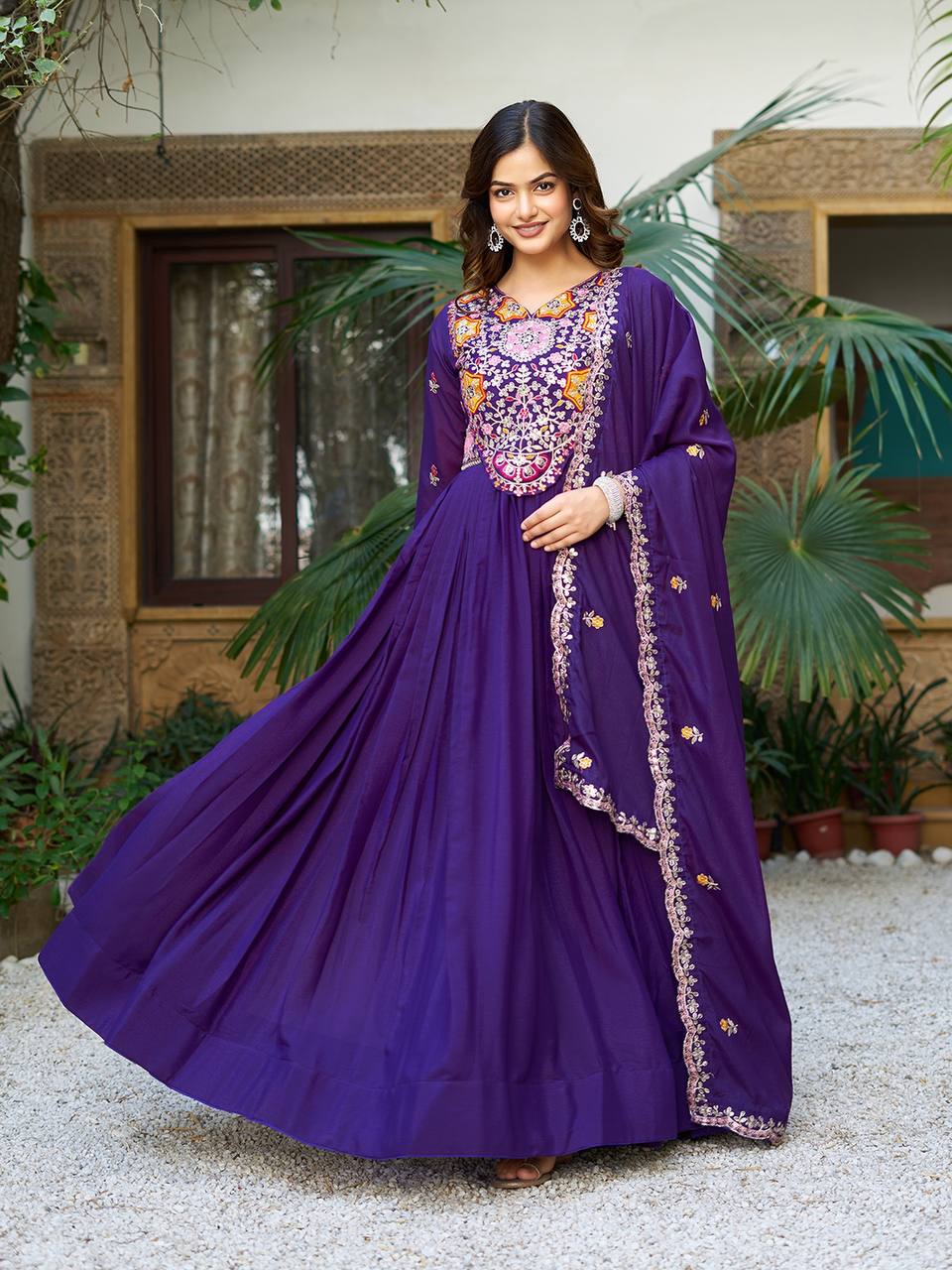 Pink heavy sequins thread embroidered georgette gown for wedding functions