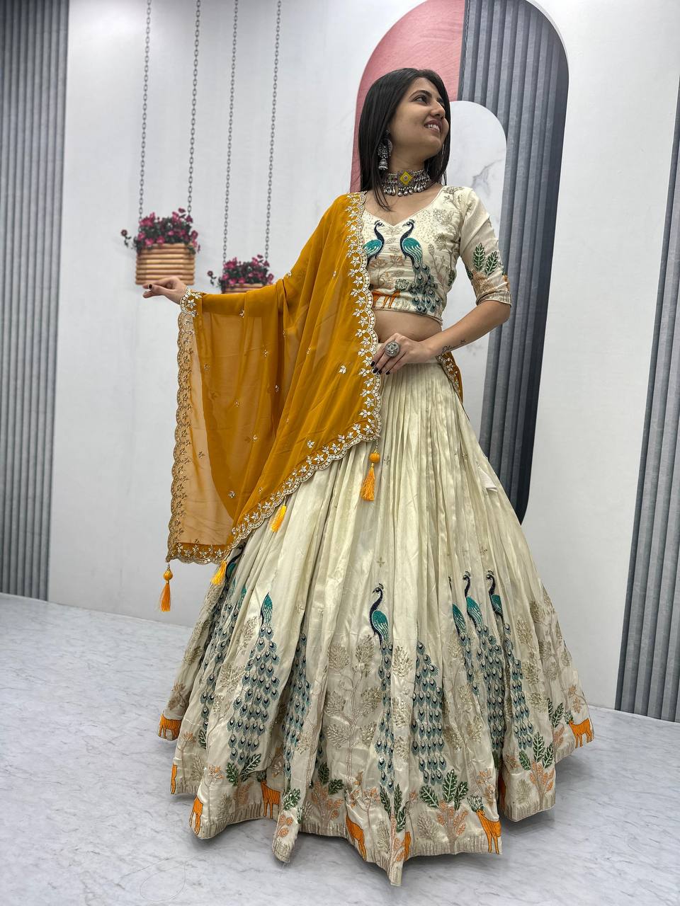 Tarini yellow tissue silk embroidered lehenga choli