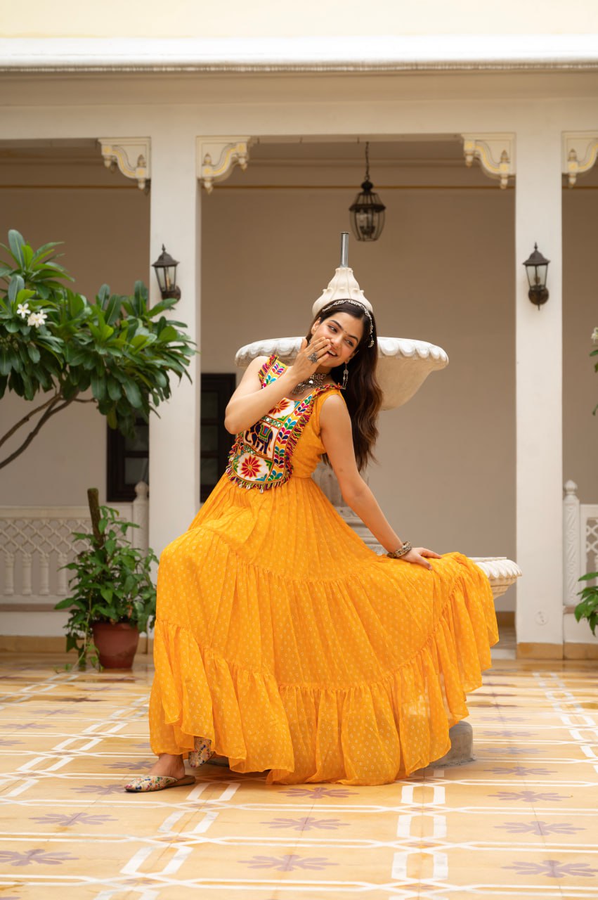 Yellow faux georgette Bandhani print Kutchi patch mirror work gown