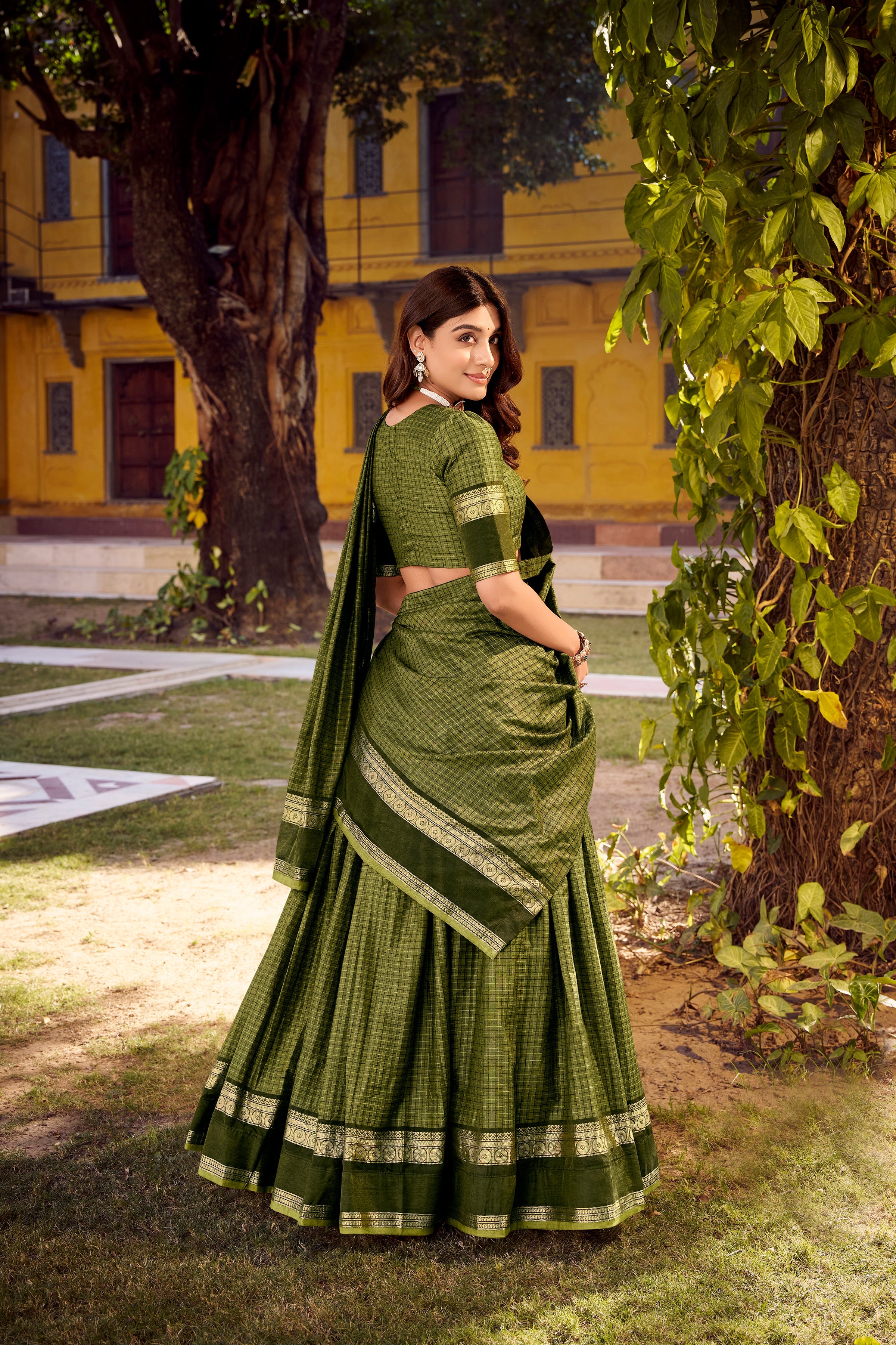 Rimi green Chettinad cotton chex half saree lehenga with zari weaving work