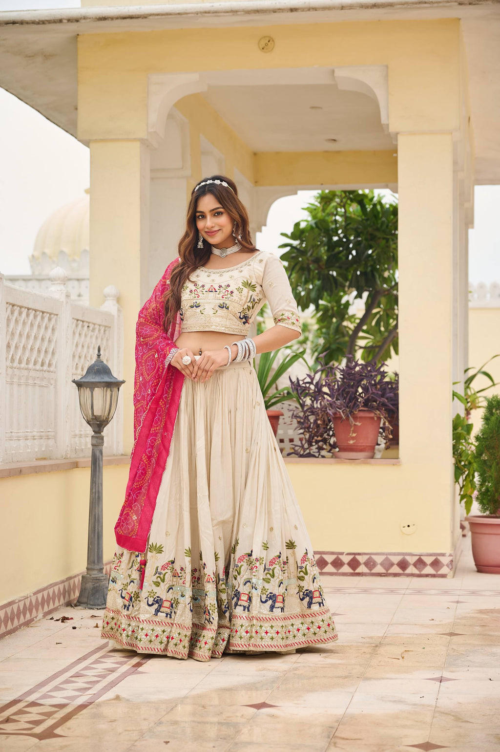Off-white silk sequins thread embroidery lehenga choli with pink Bandhej dupatta