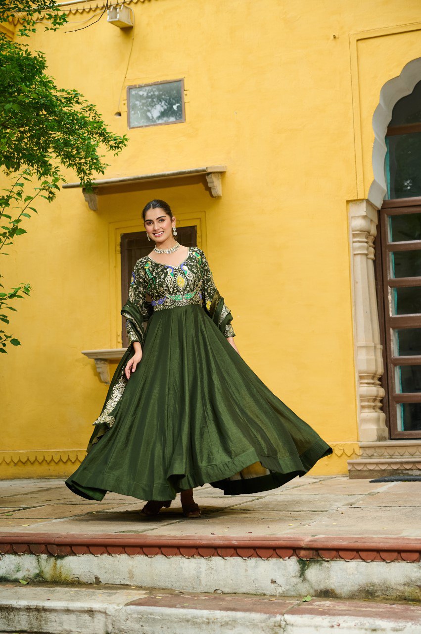 Maroon silk gown with multi thread zari embroidery and dupatta