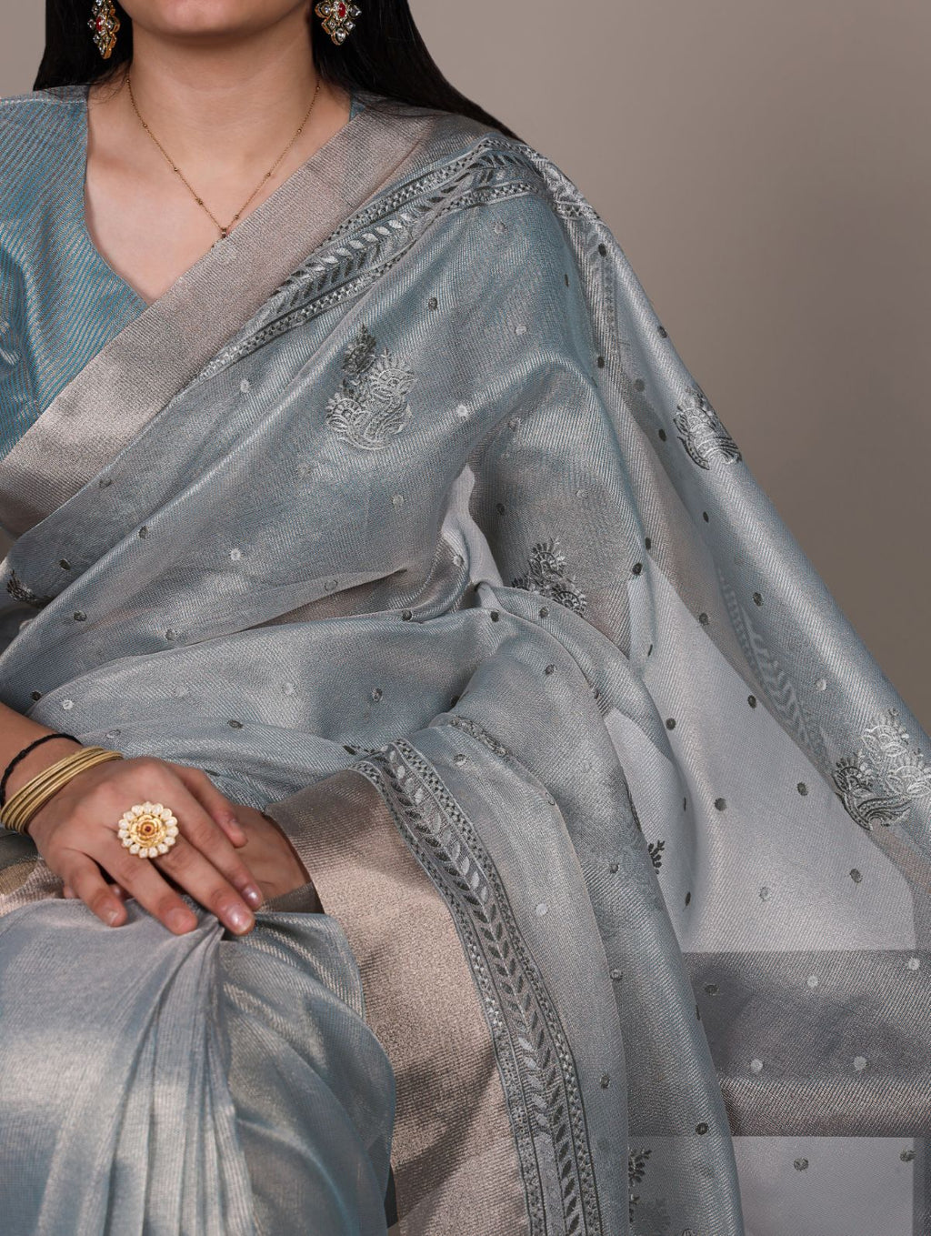 Sky blue poly shimmer thread embroidered saree with unstitched blouse