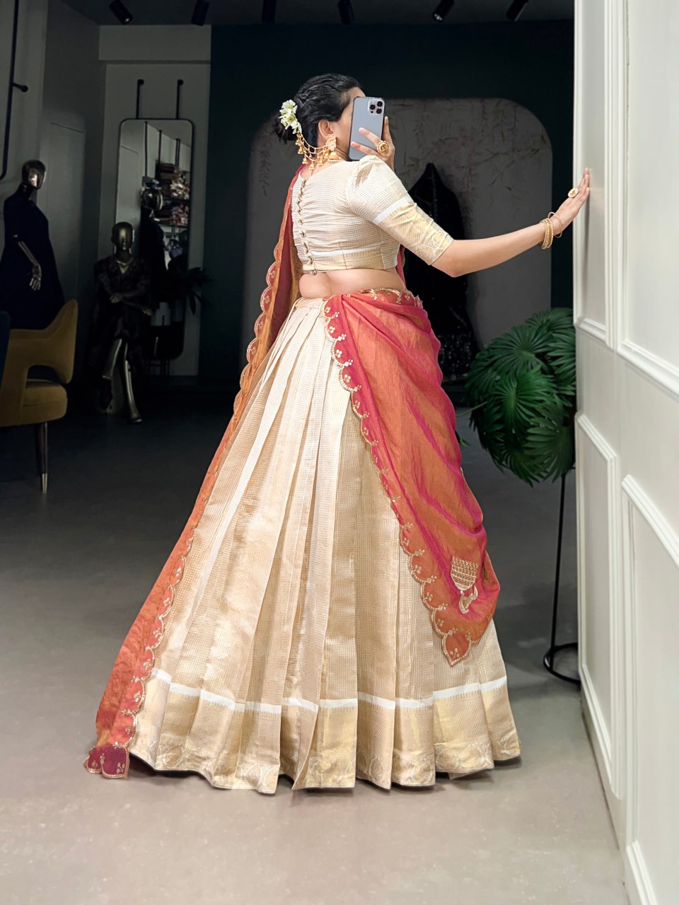 Golden jacquard chex lehenga choli with zari weaving and embroidered dupatta