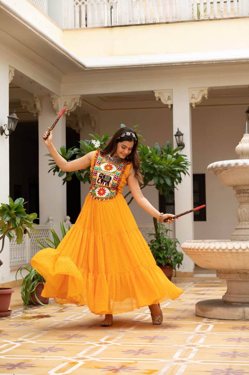 Yellow faux georgette Bandhani print Kutchi patch mirror work gown