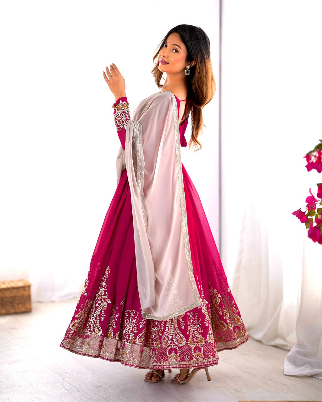 Pink georgette embroidered Tejvini designer gown