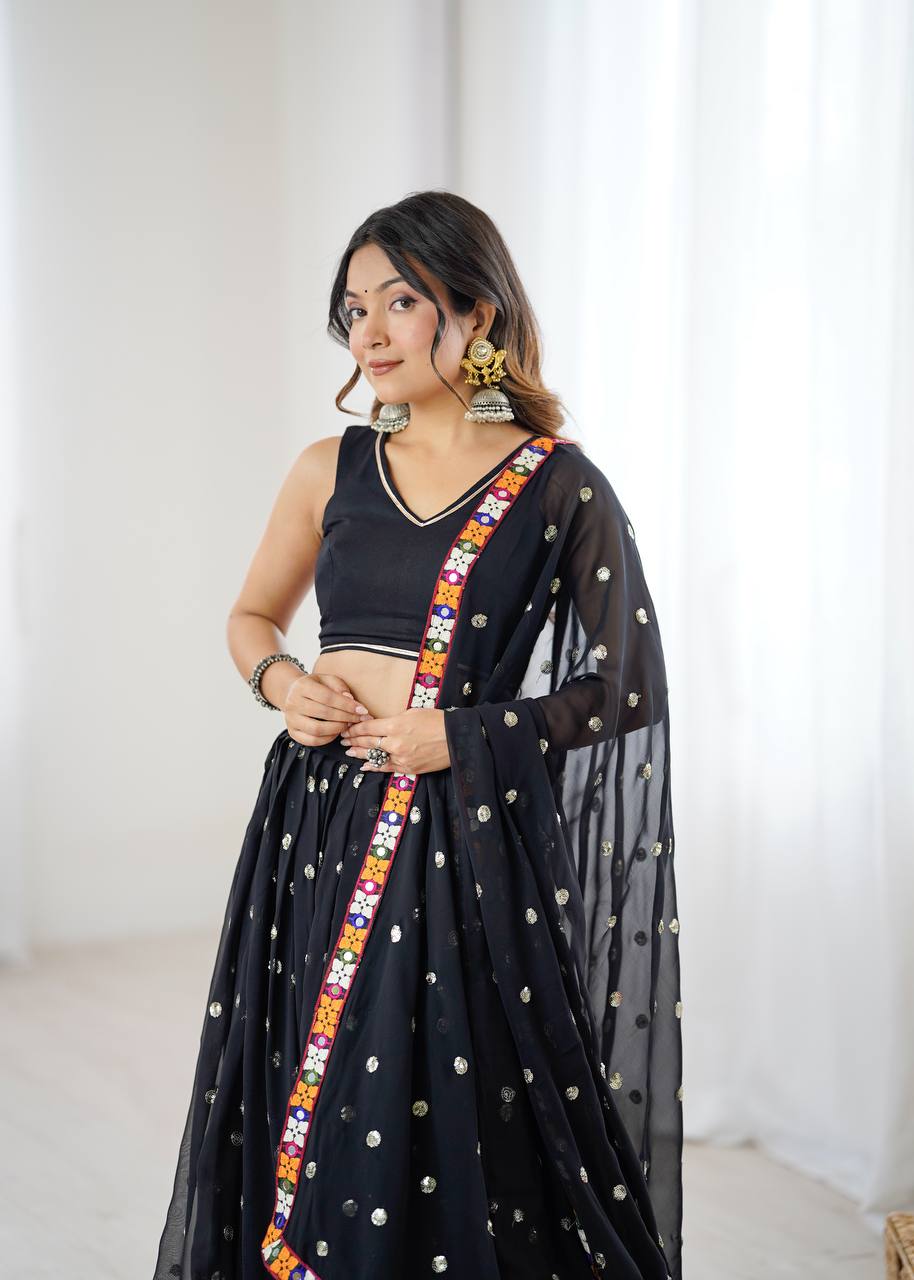 Black georgette lehenga choli with Gamthi embroidery and mirror work