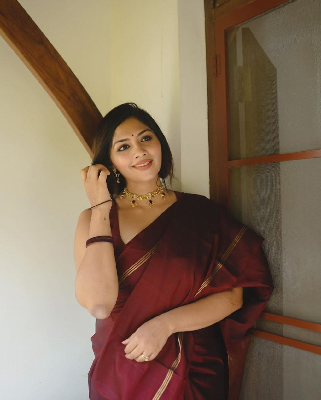 Maroon Banarasi silk Niva designer saree