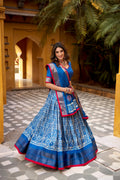 Girija blue Dola silk batik print lehenga choli with zari weaving work