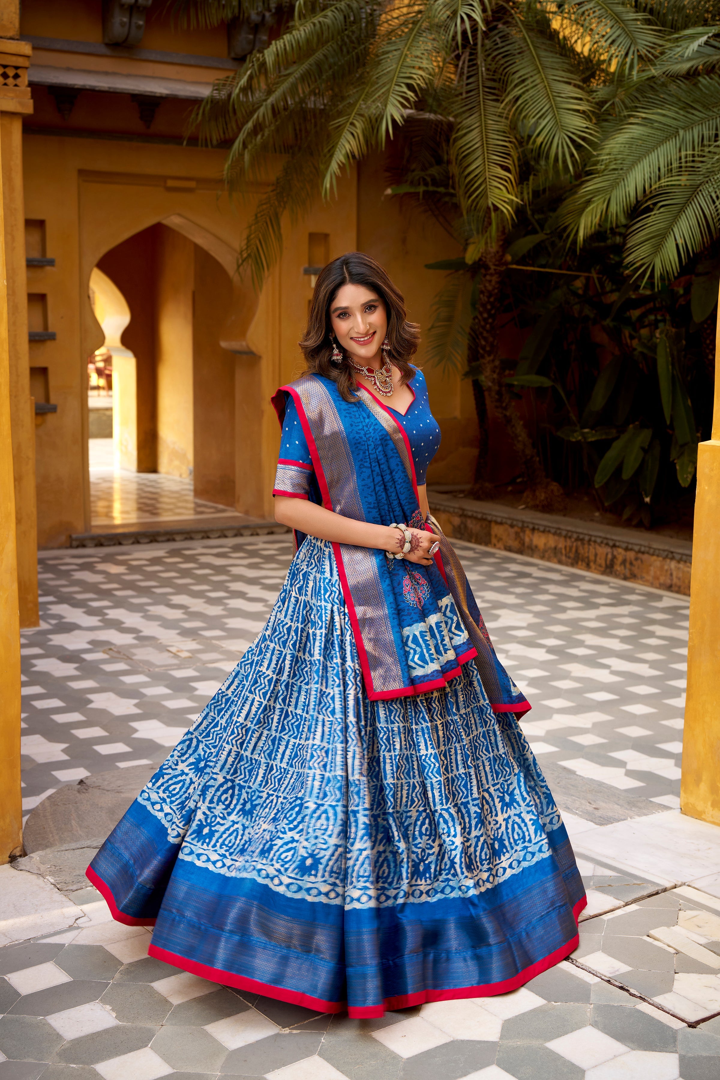Girija blue Dola silk batik print lehenga choli with zari weaving work