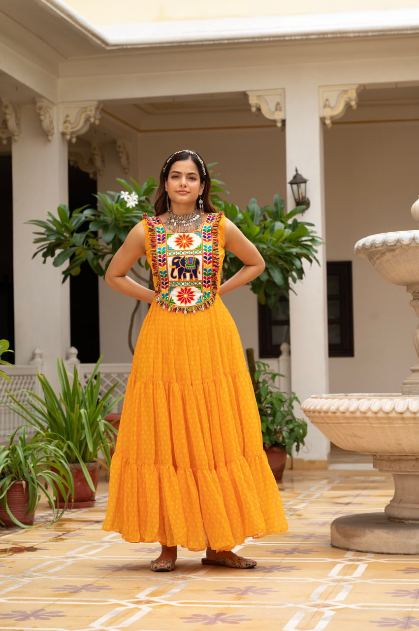 Yellow faux georgette Bandhani print Kutchi patch mirror work gown
