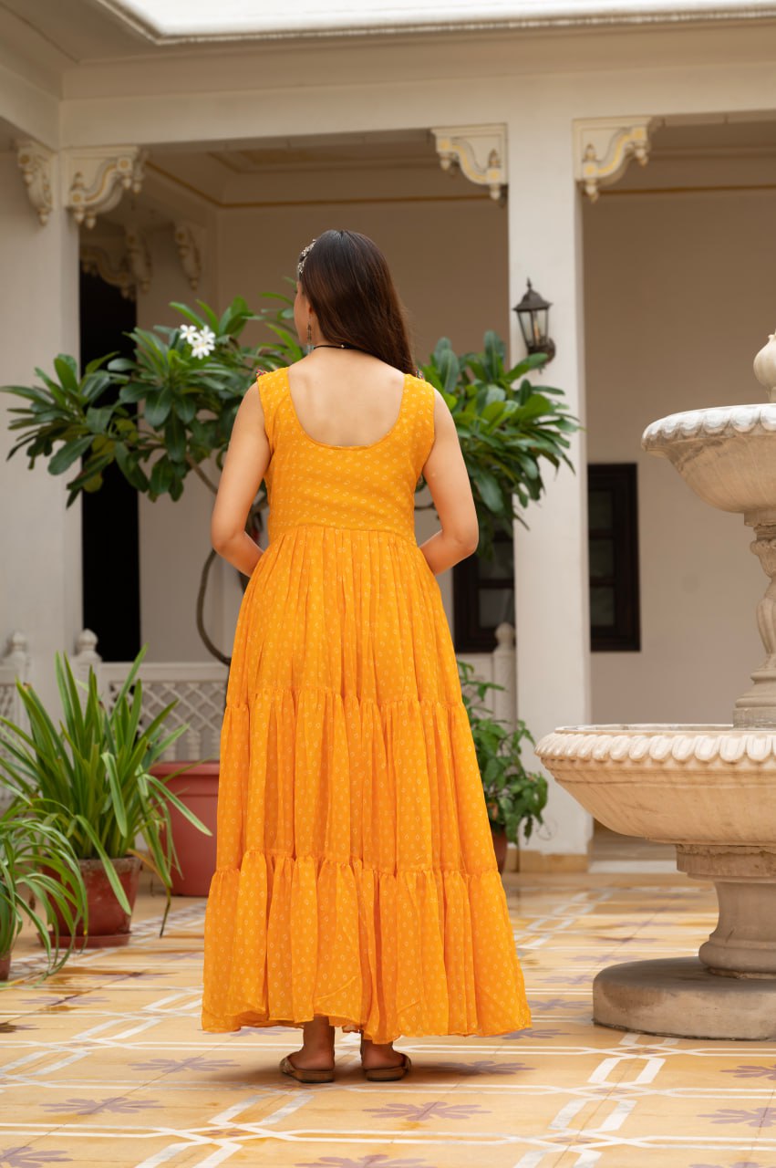 Yellow faux georgette Bandhani print Kutchi patch mirror work gown