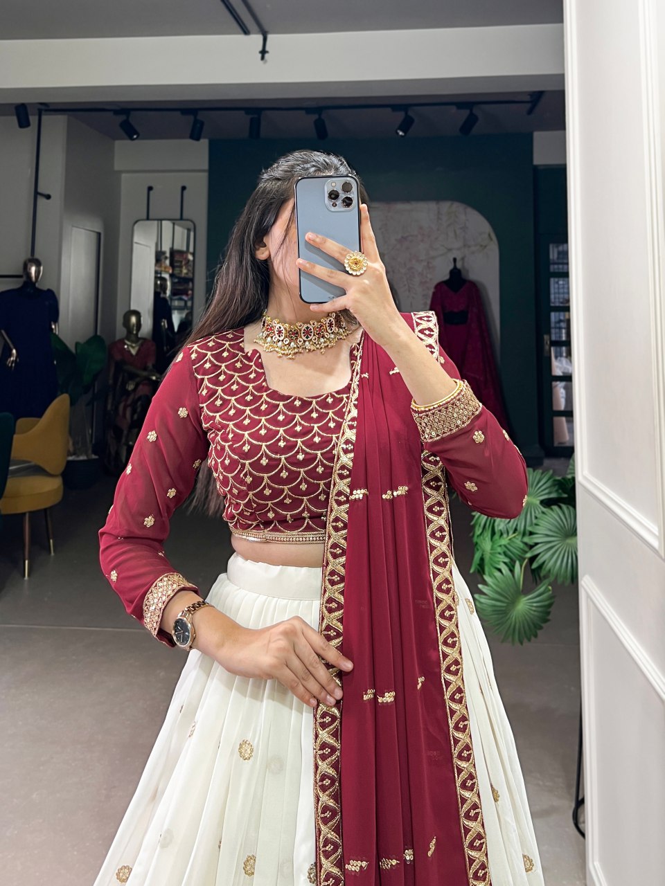 Bhavini Maroon Embroidered Georgette Lehenga Choli, featuring intricate sequins and thread embroidery with elegant lace detailing. The fully stitched lehenga has a 3.5-meter flair, can-can, and canvas stitching for a graceful silhouette. Paired with an unstitched embroidered georgette blouse and a matching dupatta with sequins work, this designer ensemble is perfect for weddings, festive occasions, and grand celebrations