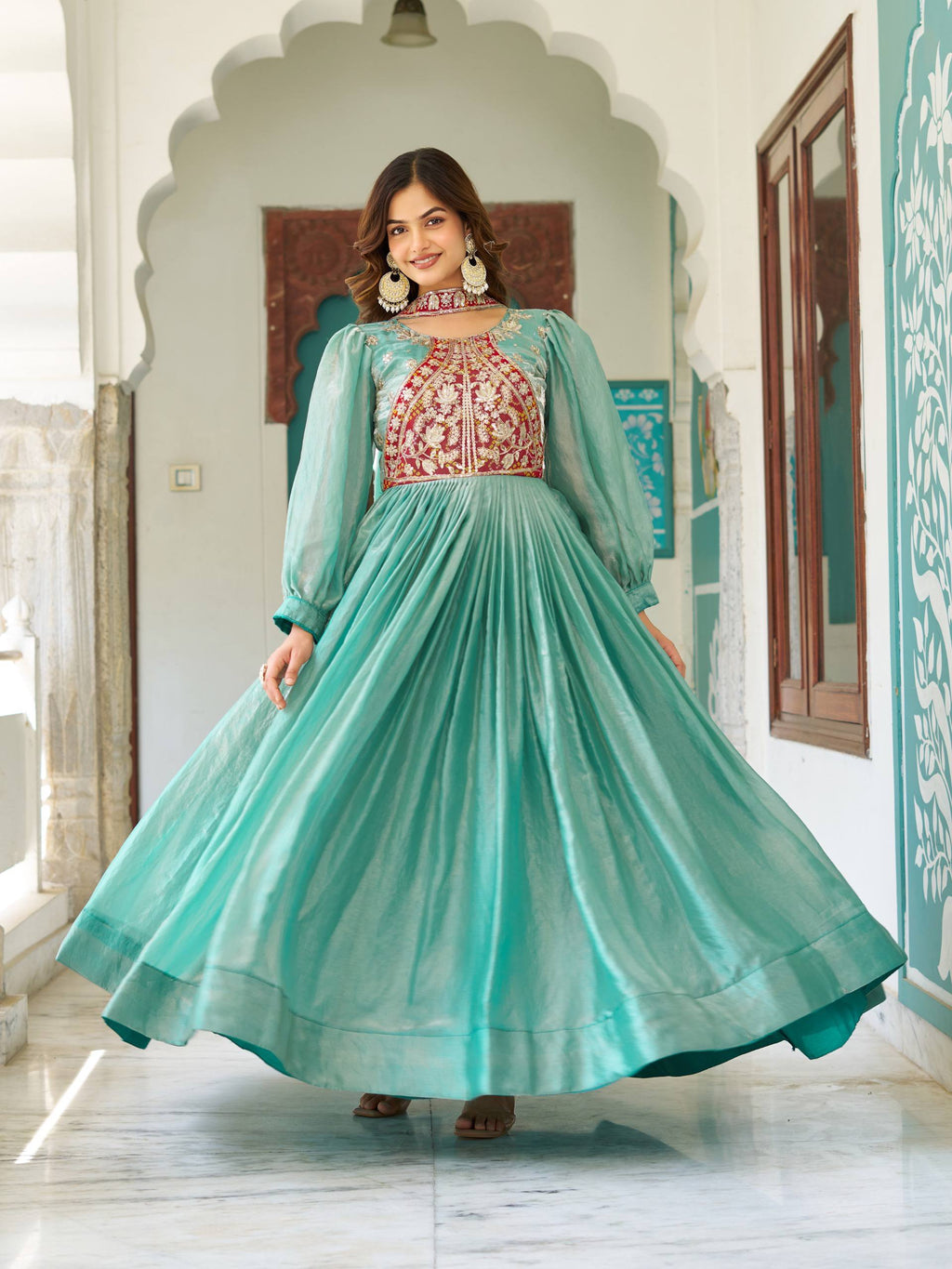 Ritu sea green Fendy silk gown with sequins thread embroidery and dupatta