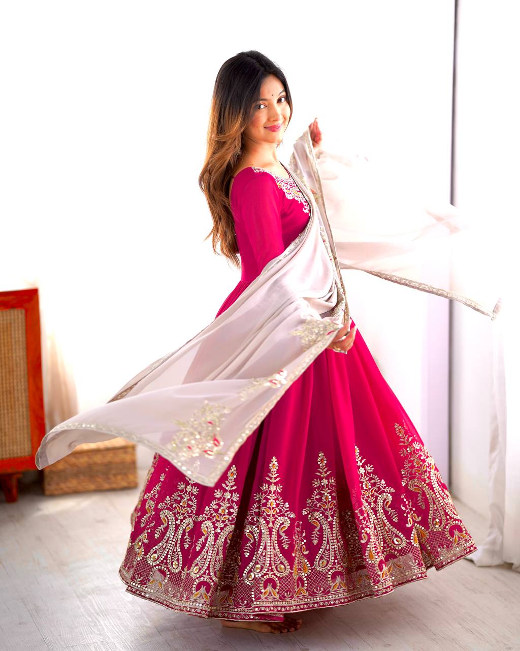 Pink georgette embroidered Tejvini designer gown