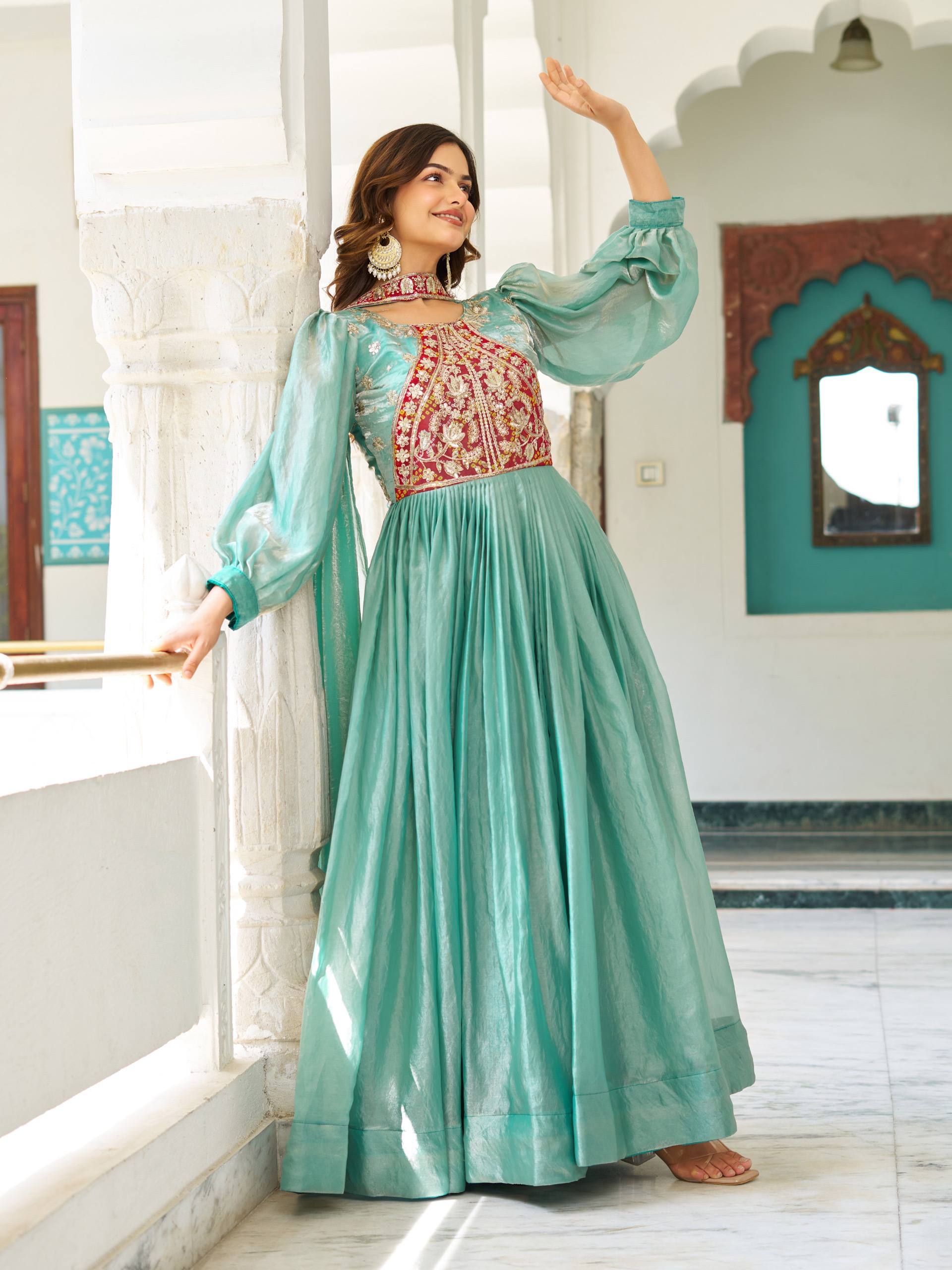 Ritu sea green Fendy silk gown with sequins thread embroidery and dupatta