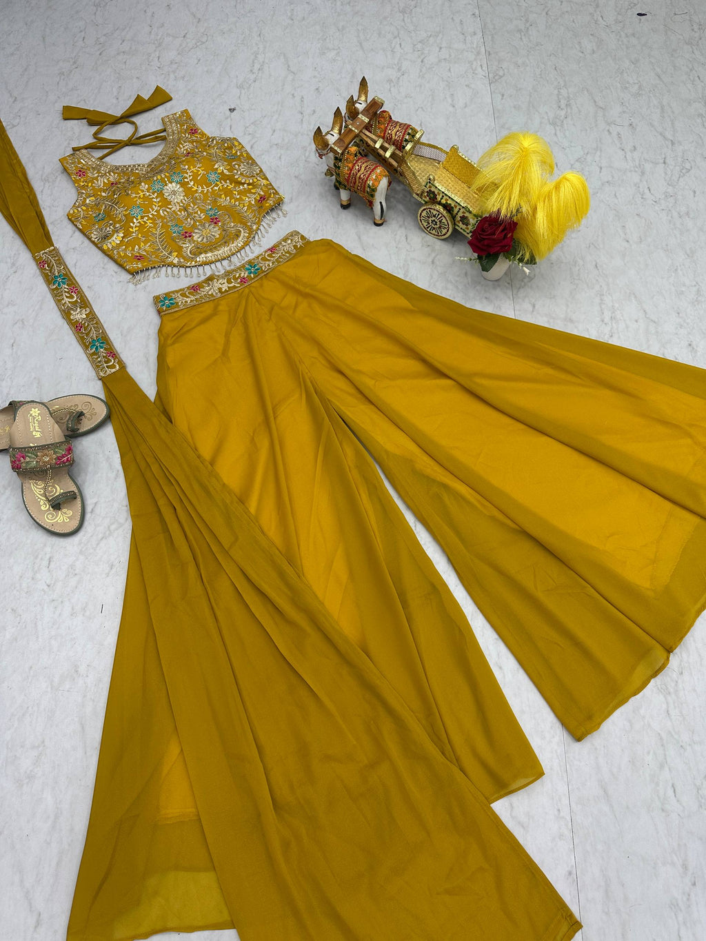 Stuti mustard yellow star georgette top palazzo set with sequins thread embroidery