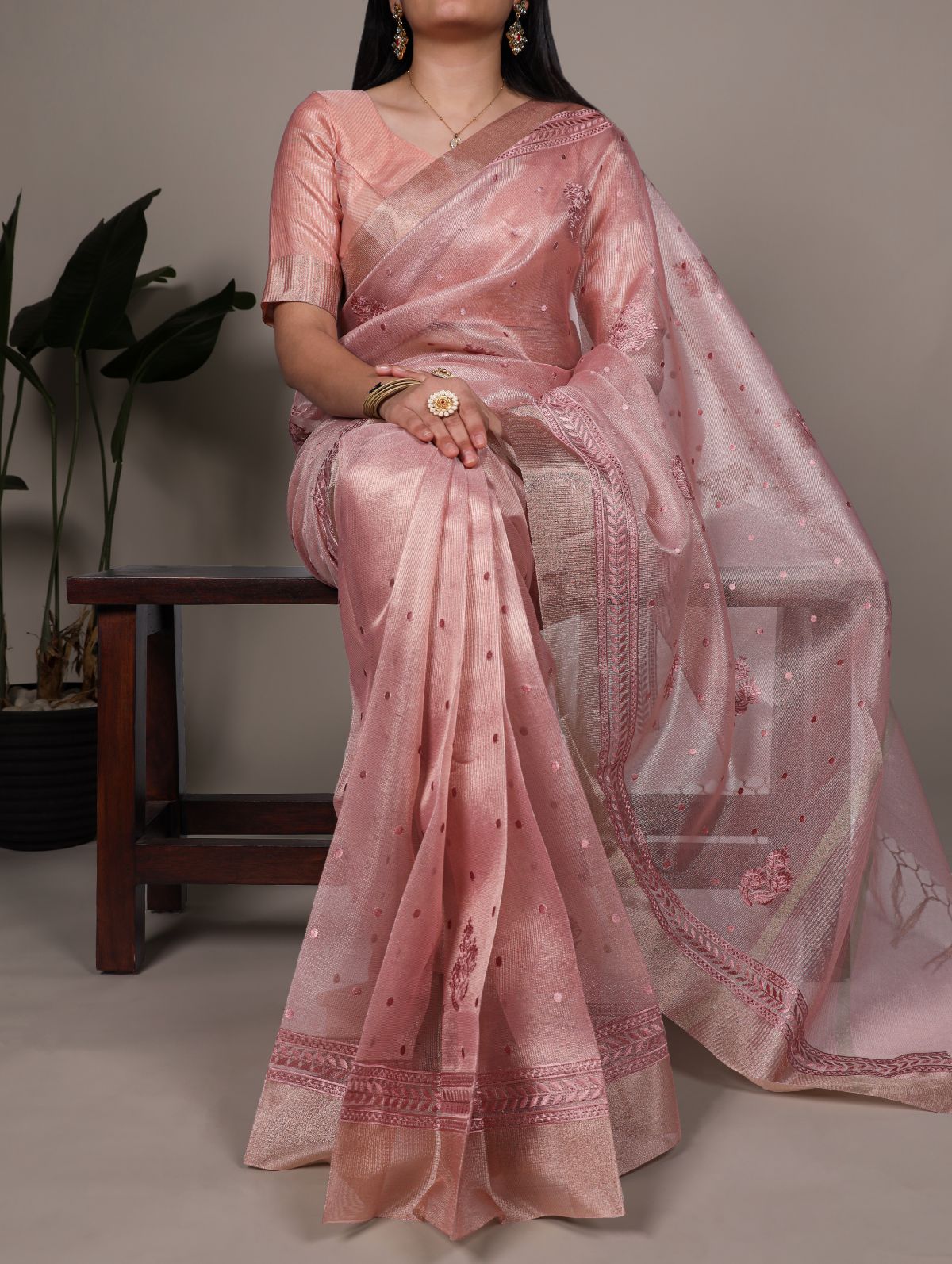 Light pink poly shimmer thread embroidered saree with unstitched blouse
