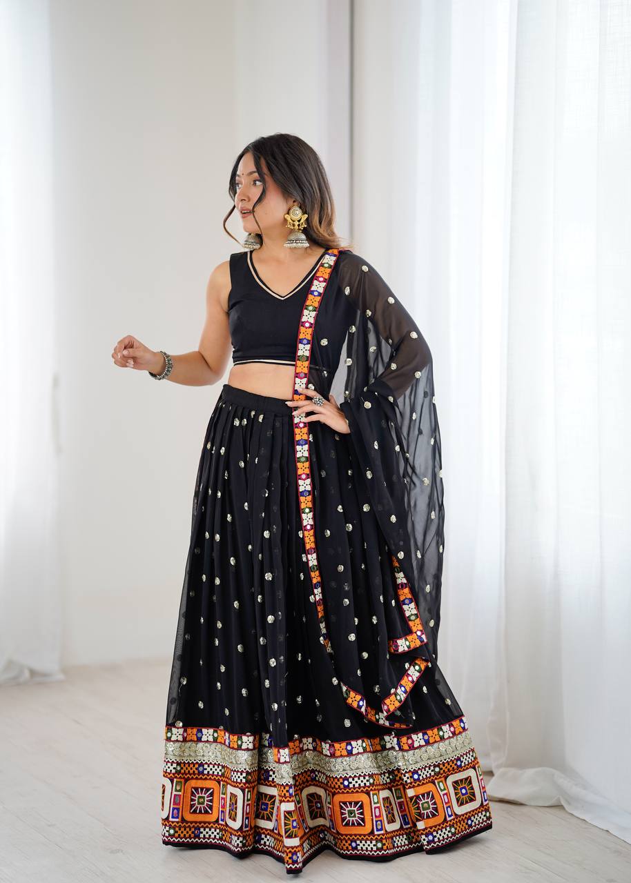Black georgette lehenga choli with Gamthi embroidery and mirror work