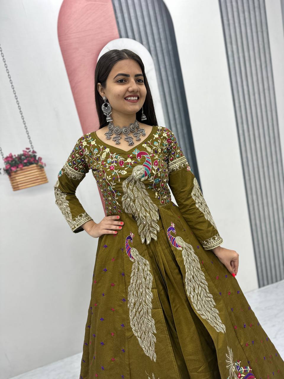 Mani olive green Vichitra silk crop top peacock design lehenga with embroidered shrug