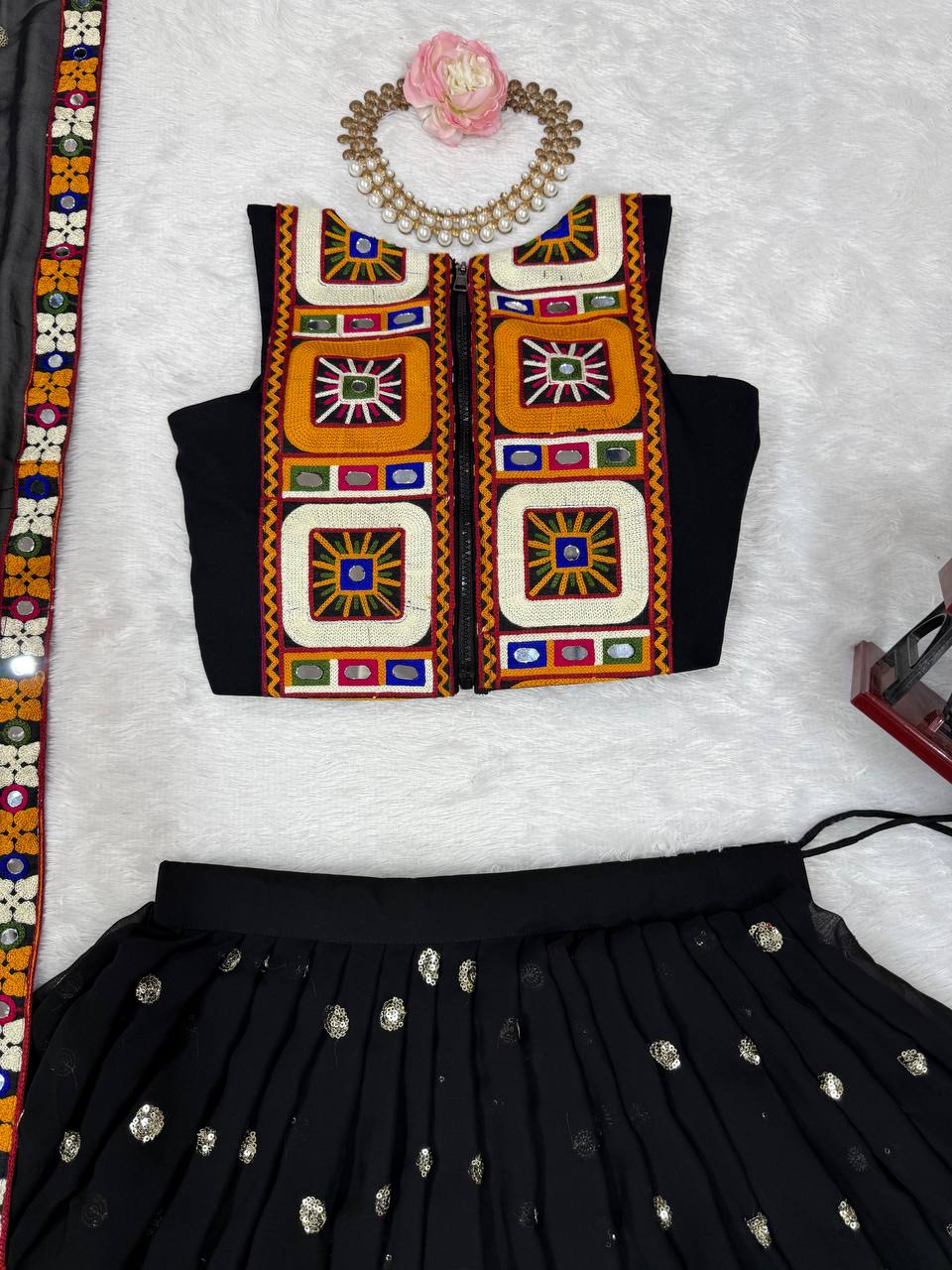 Black georgette lehenga choli with Gamthi embroidery and mirror work