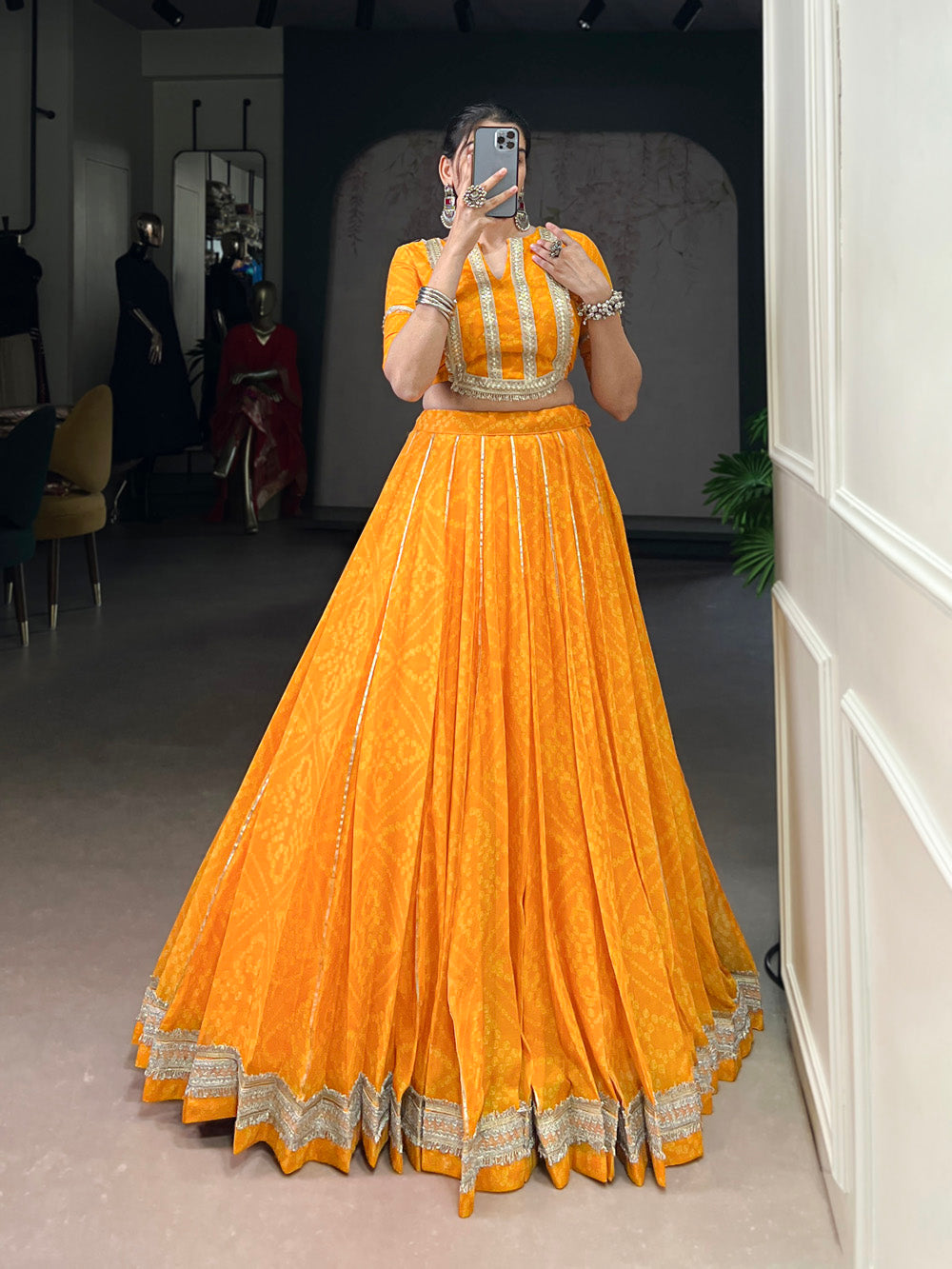 Yellow chiffon lehenga choli with Bandhej print and Gota Patti lace
