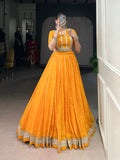 Yellow chiffon lehenga choli with Bandhej print and Gota Patti lace