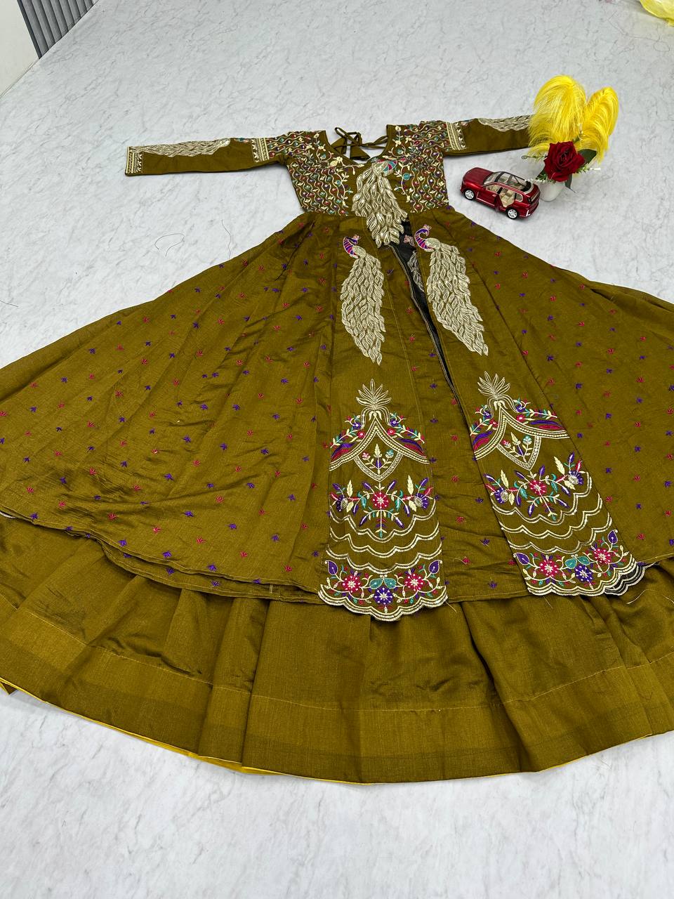 Mani olive green Vichitra silk crop top peacock design lehenga with embroidered shrug