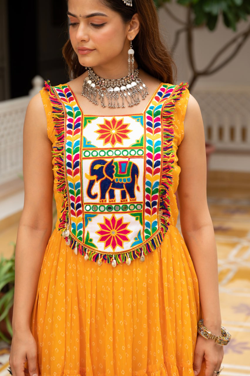 Yellow faux georgette Bandhani print Kutchi patch mirror work gown