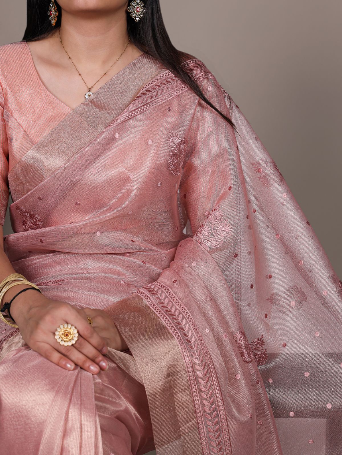 Light pink poly shimmer thread embroidered saree with unstitched blouse
