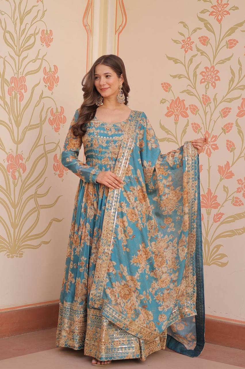 Teal blue Russian silk printed gown with embroidered sequins work and dupatta