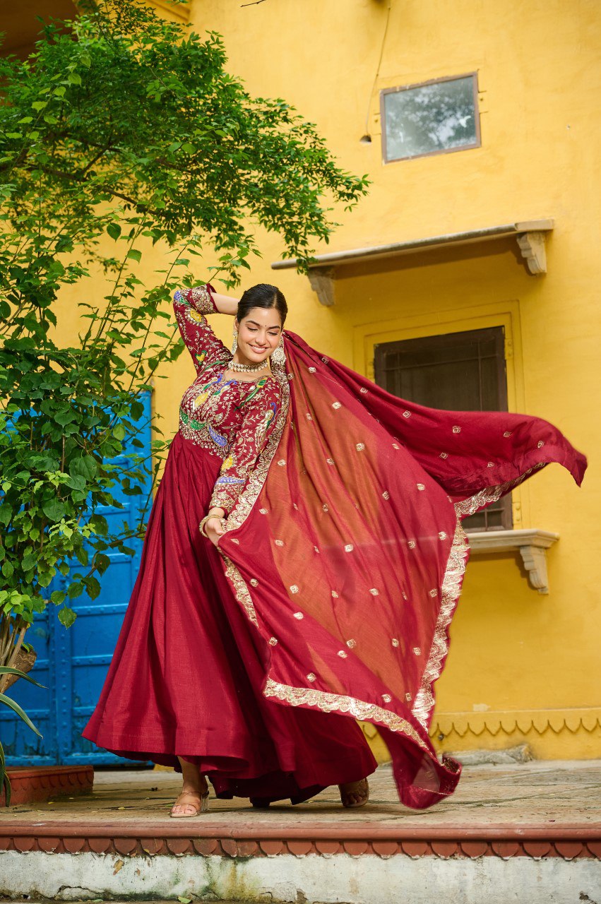 Maroon silk gown with multi thread zari embroidery and dupatta