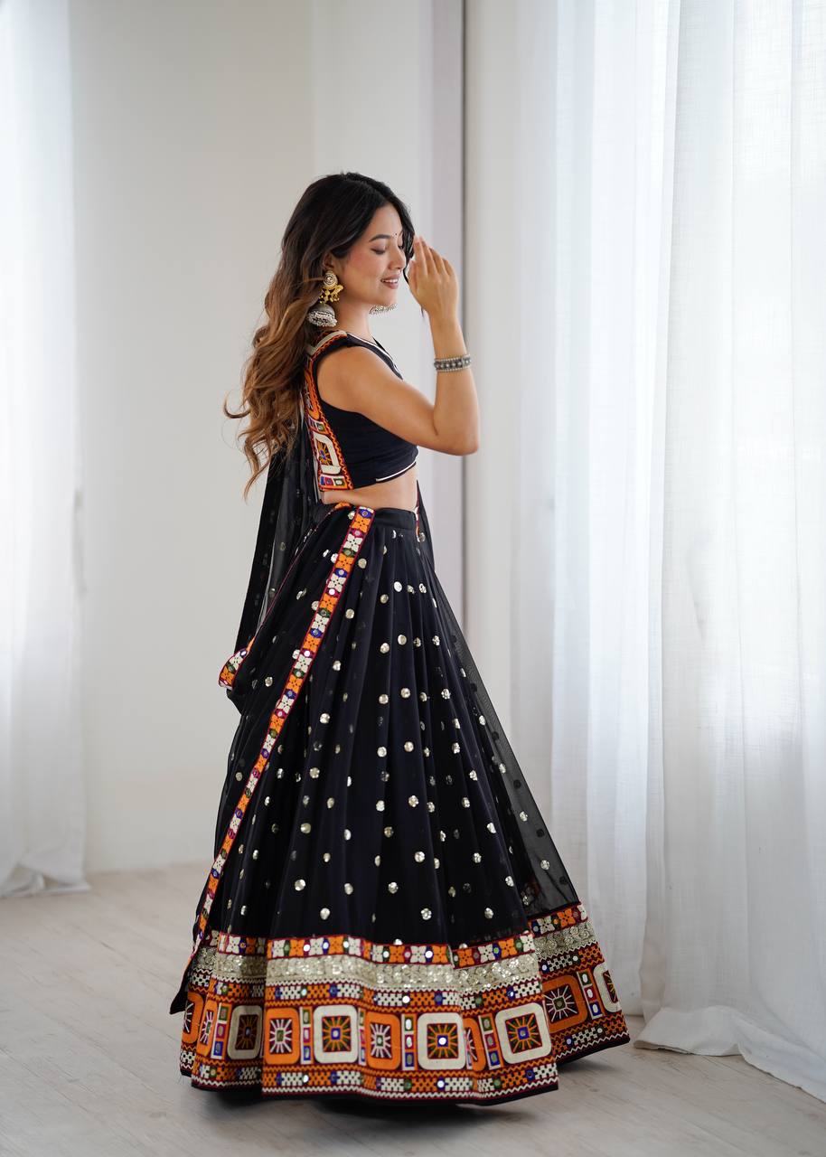 Black georgette lehenga choli with Gamthi embroidery and mirror work