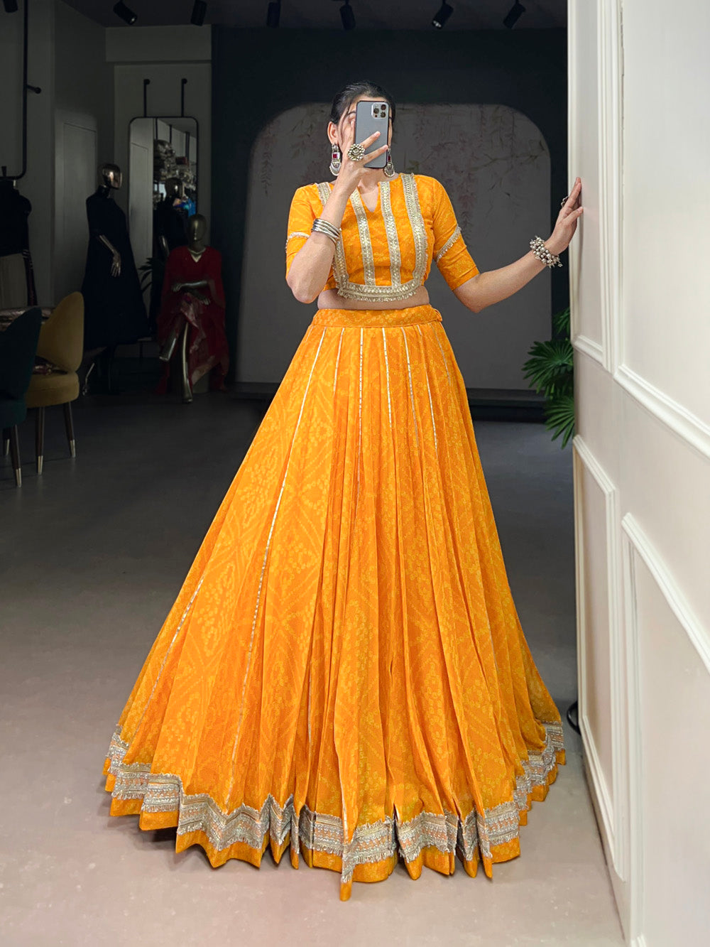 Yellow chiffon lehenga choli with Bandhej print and Gota Patti lace