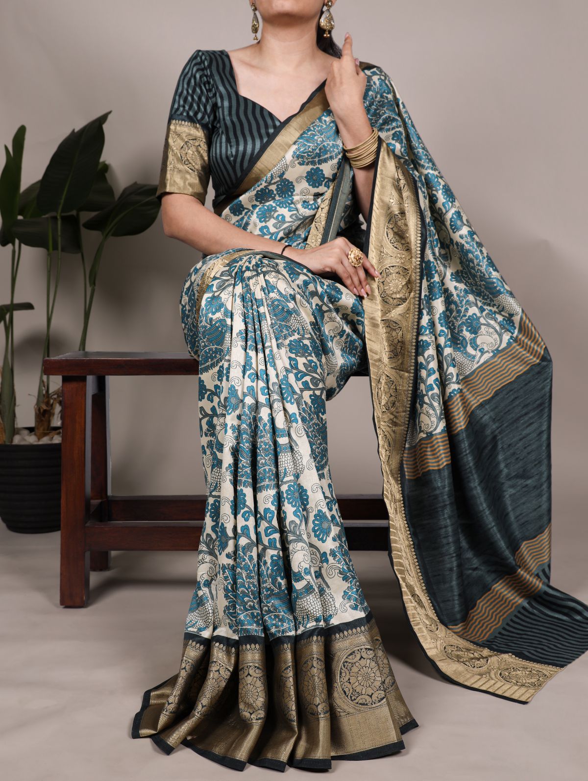 Teal blue tasar silk printed saree with viscose border and blouse