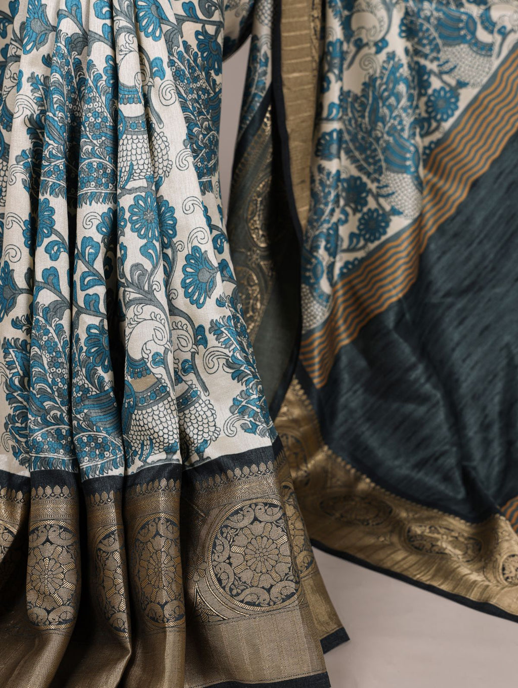 Teal blue tasar silk printed saree with viscose border and blouse