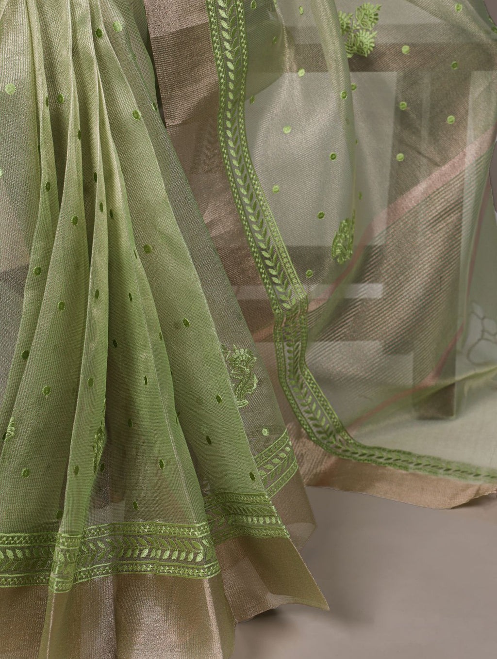 Pista green poly shimmer thread embroidered saree with unstitched blouse