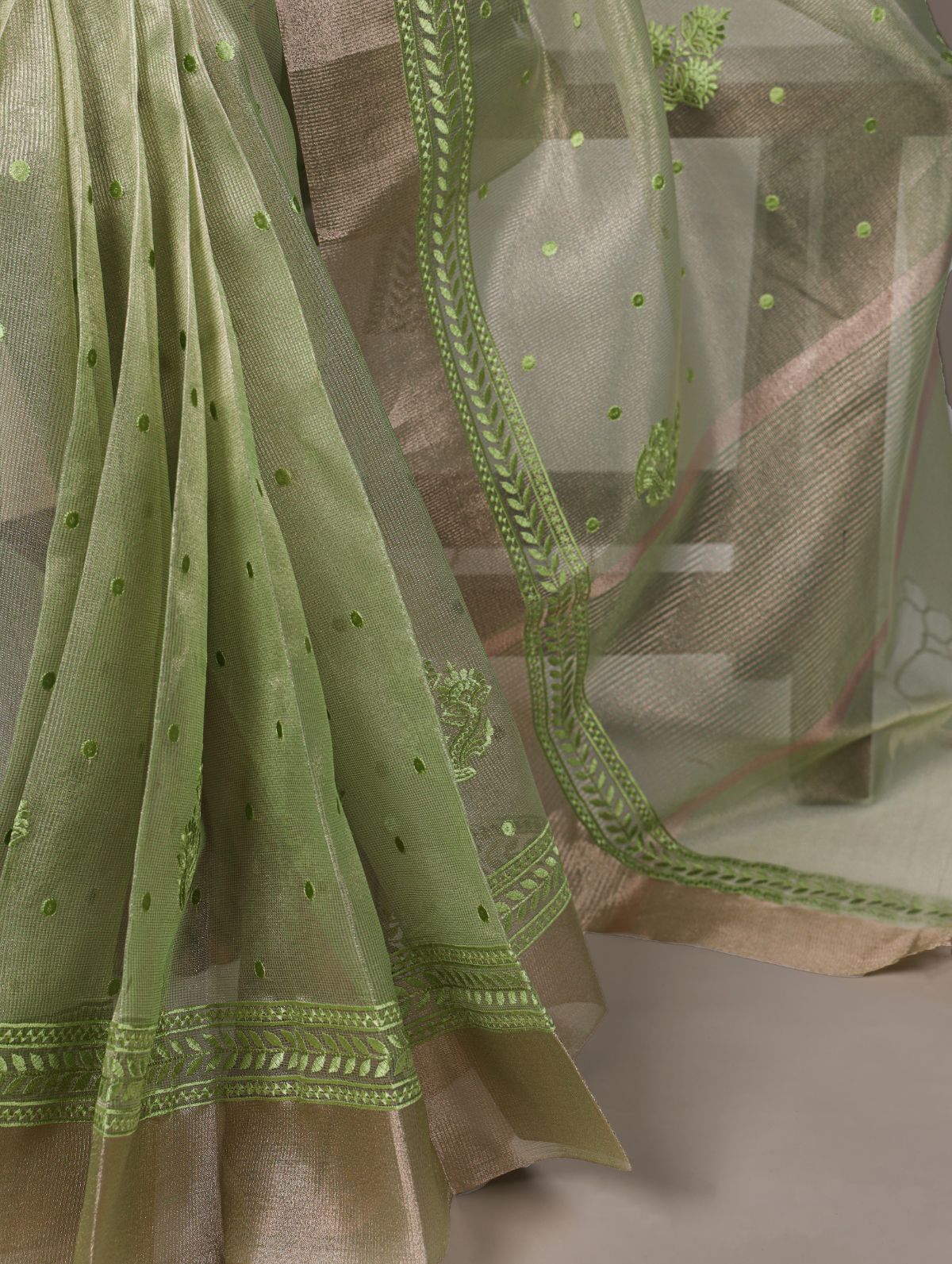 Pista green poly shimmer thread embroidered saree with unstitched blouse