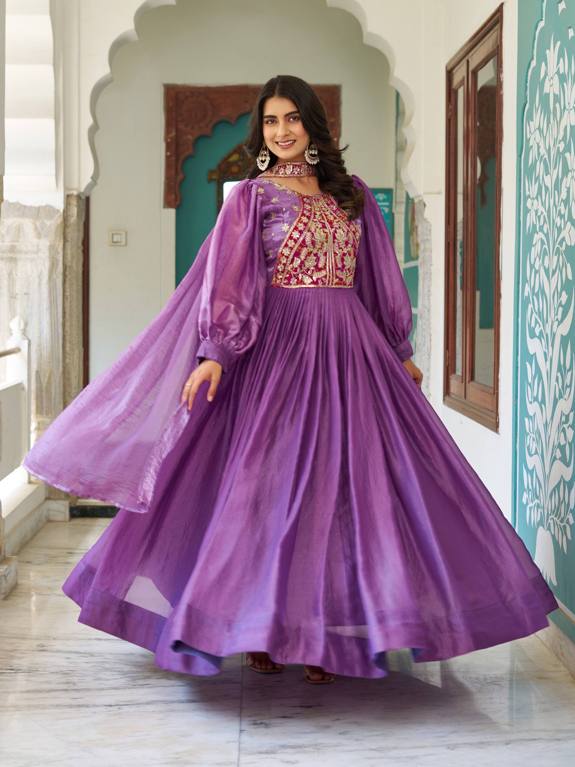 Ritu purple Fendy silk gown with sequins thread embroidery and dupatta