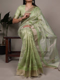 Pista green poly shimmer thread embroidered saree with unstitched blouse