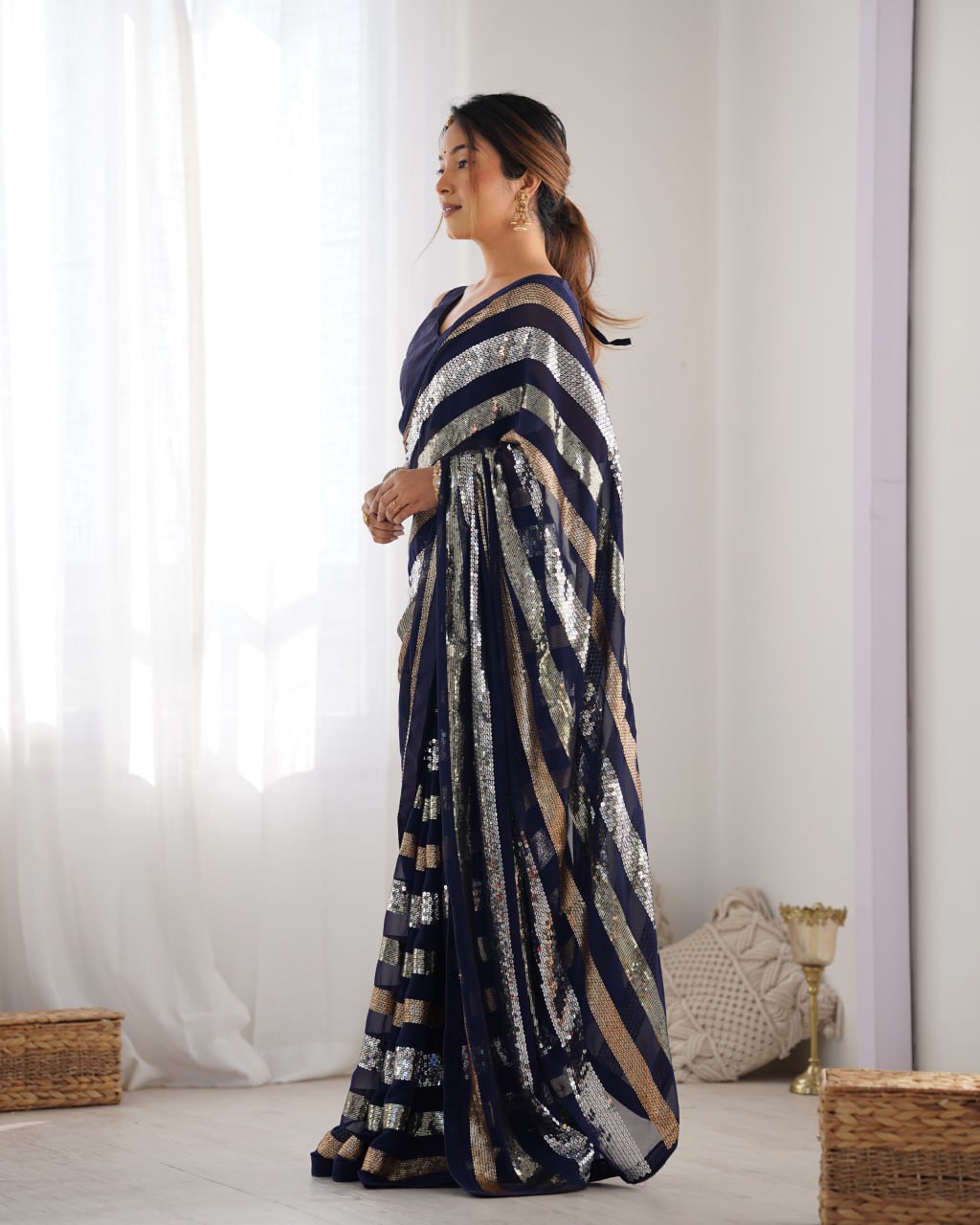 Deep blue georgette sequin embroidered Kira designer saree