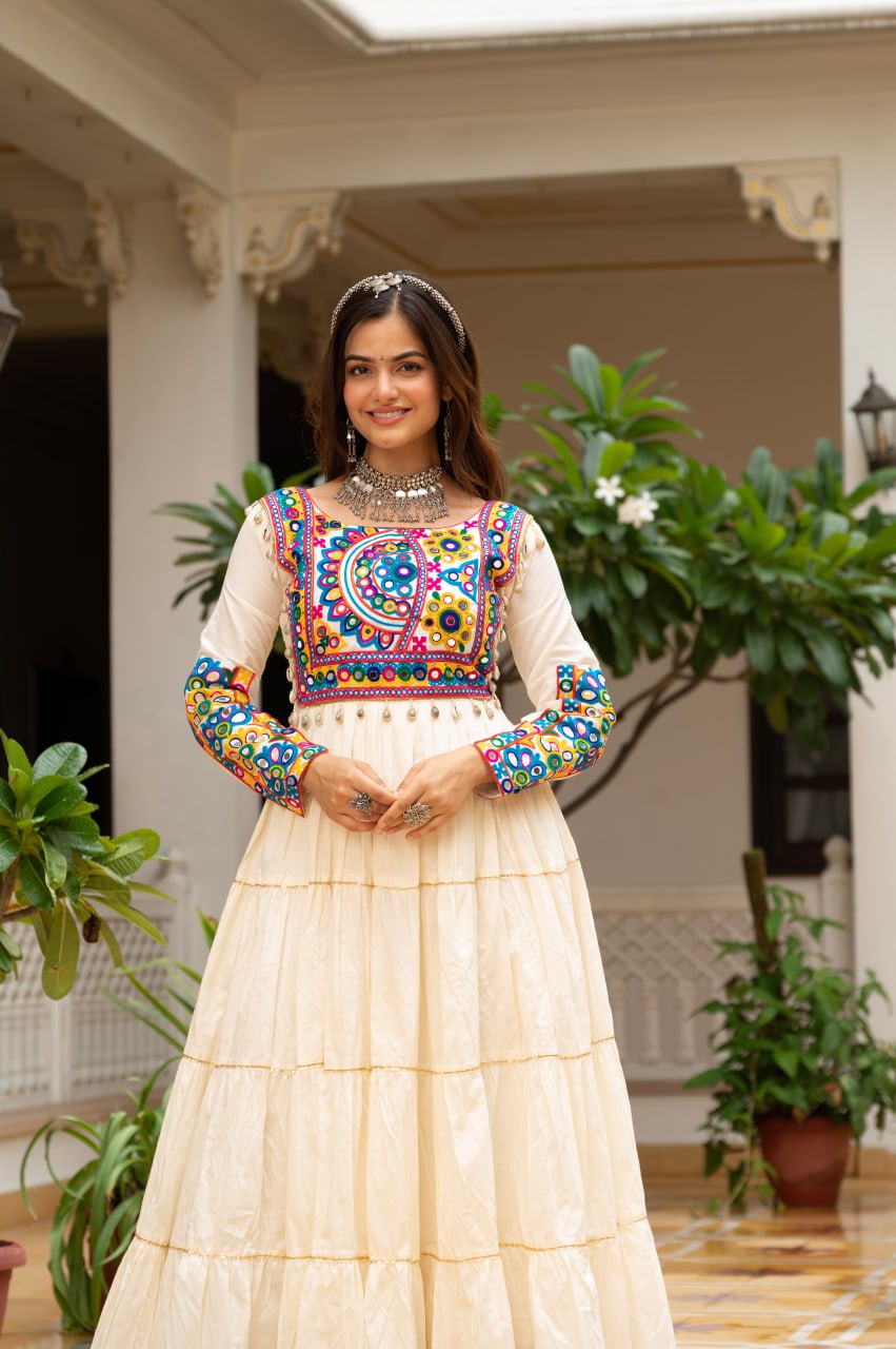 Off-white cotton gown with Kutchi Gamthi mirror embroidery and lace